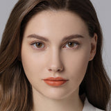 modelwearinghidrocor ochre brown colored contacts