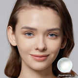 modelwearingfancy aquamarine blue colored contacts