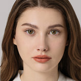 modelwearingsymphony 3con green colored contacts