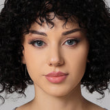 model wearing aqua blue colored contacts