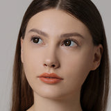 modelwearingglass ball chocolate brown colored contacts
