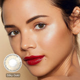 modelwearingbellalens silky gold colored contacts