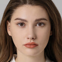 modelwearingspanish real peach colored contacts