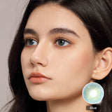 model wearing cloud blue colored contacts